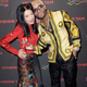 Designer Vivienne Tam and “guest,” aka Not Sisqó (Image via Getty)